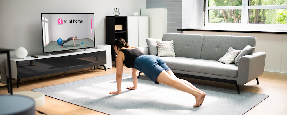 Woman doing a plank exercise at home